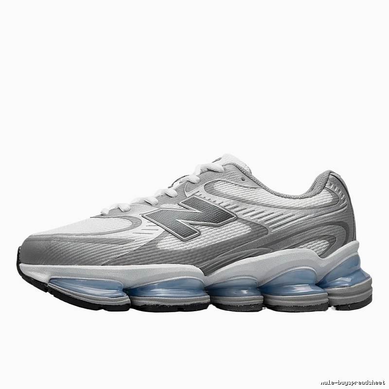 New Balance retro-style silver and white sports shoes